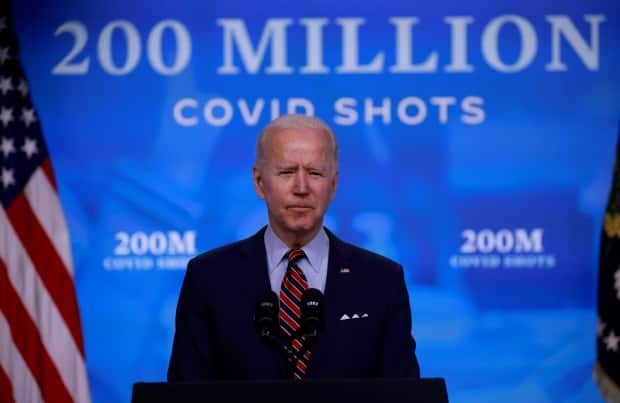 U.S. President Joe Biden says 200 million COVID-19 vaccine doses have now been administered in the U.S., double his original target for his first 100 days. (Tom Brenner/Reuters - image credit)