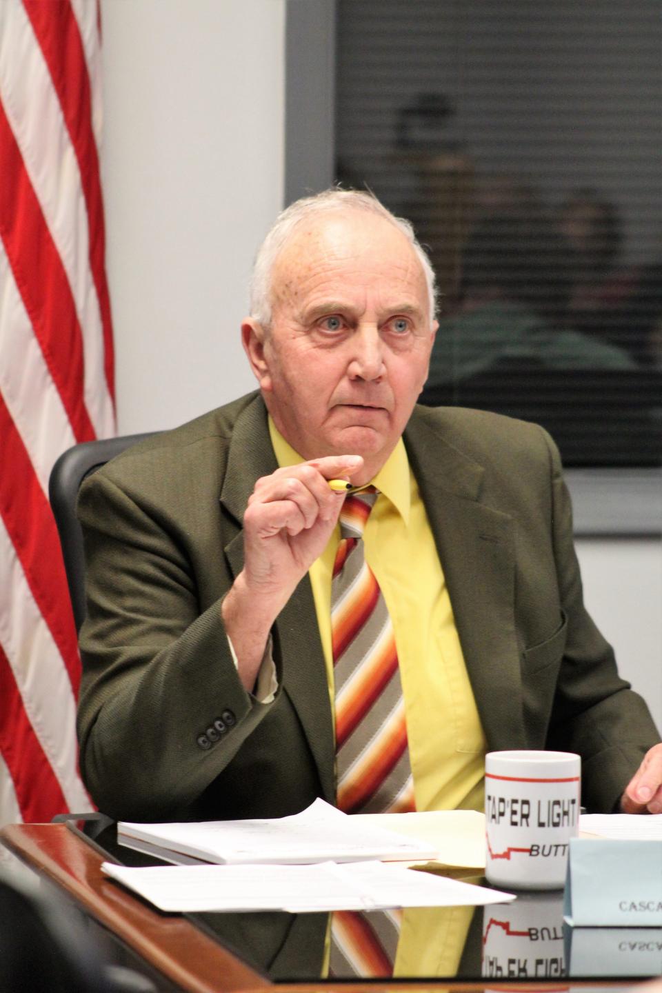 County Commissioner Don Ryan defends the performance of commissioners and the County Election Office before a largely hostile crowd at Tuesday's special meeting.