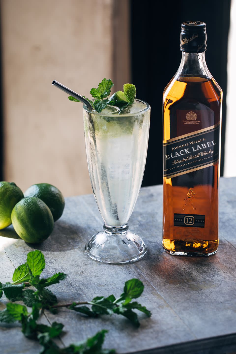 <p><strong>Ingredients</strong></p><p>1.5 oz Johnnie Walker Black <br>4.5 oz coconut soda <br>Ice cubes made from coconut water<br>Lime wheels<br>Mint sprigs <br><br><strong>Instructions</strong></p><p>Place coconut water ice cubes in a soda glass. Add 2-3 lime wheels in the glass. Pour in Johnnie Walker Black and top with coconut soda. Garnish with mint and lime. </p><p><em>Recipe courtesy of Daniel Guillen. </em></p>