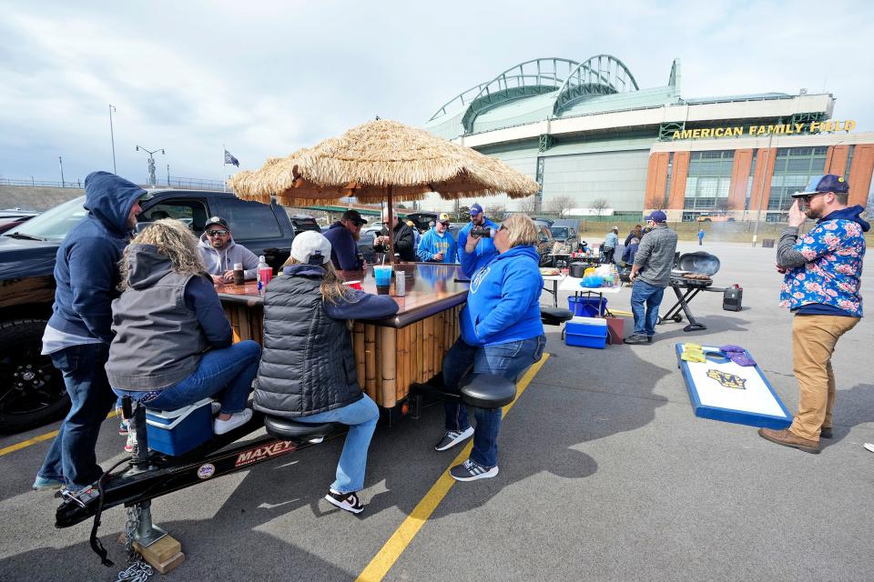 Tailtating is a popular pastime before Milwaukee Brewers games.