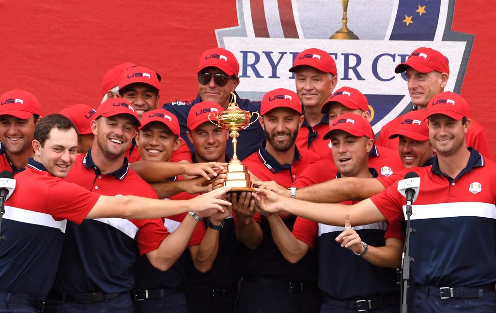 Team USA team celebrate with the Ryder Cup trophy after thrashing Europe 19-9 at Whistling Straits (Anthony Behar/PA) (PA Wire)