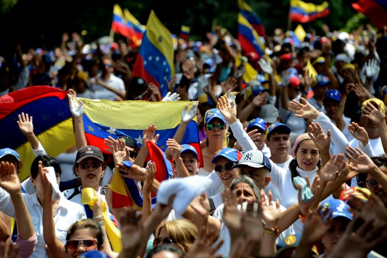 Venezuelan opposition activists join a silent march in protest at the government of President NIcolas Maduro, in the border state of Tachira-San Cristobal