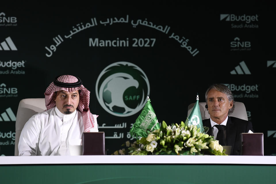 Roberto Mancini and Yasser Al Misehal, the Saudi Arabian Football Federation president, attend a press conference in Riyadh, Saudi Arabia, on Monday, Aug. 28, 2023. Mancini was appointed coach of the Saudi Arabia national team on Sunday, just two weeks after the European Championship-winning manager surprisingly left his job in charge of Italy. (AP Photo)