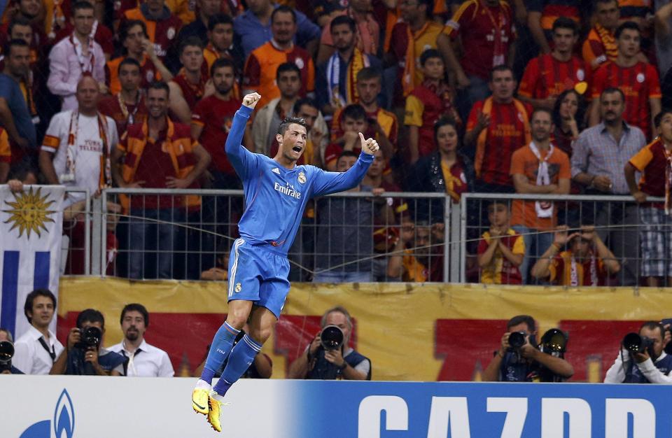 Real Madrid's Cristiano Ronaldo celebrates a goal gainst Galatasaray during their Champions League Group B soccer match at Turk Telekom Arena in Istanbul September 17, 2013. REUTERS/Murad Sezer (TURKEY - Tags: SPORT SOCCER)