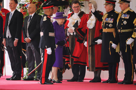 Britain's Queen Elizabeth arrives ahead of the ceremonial welcome for King Willem-Alexander and Queen Maxima of the Netherlands at Horse Guards Parade, in London, Britain October 23, 2018. Christopher Furlong/Pool via REUTERS