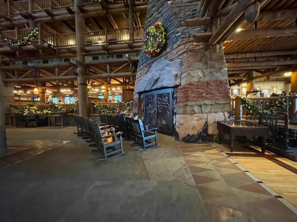 view of the big fireplace in the lobby at disney's wilderness lodge