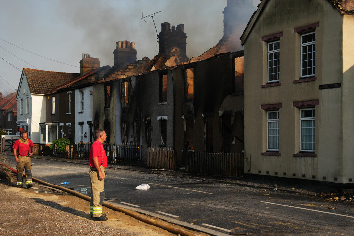 WENNINGTON, GREATER LONDON - JULY 19: Emergency services fight fires on July 19, 2022 in Wennington, England. A series of grass fires broke out around the British capital amid an intense heatwave. (Photo by Carl Court/Getty Images)