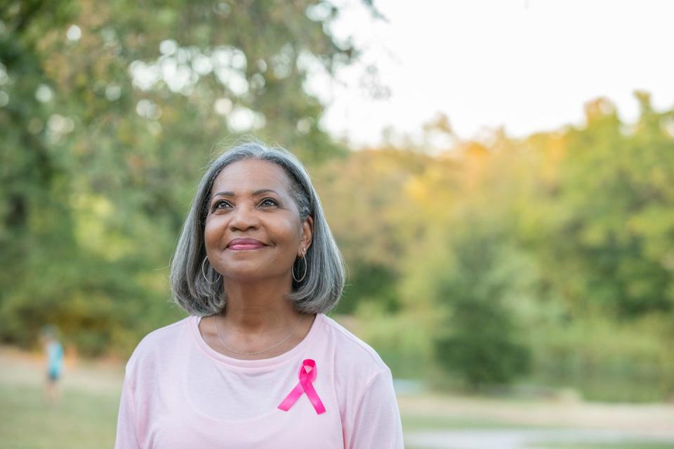 november holidays  woman wearing pink ribbon