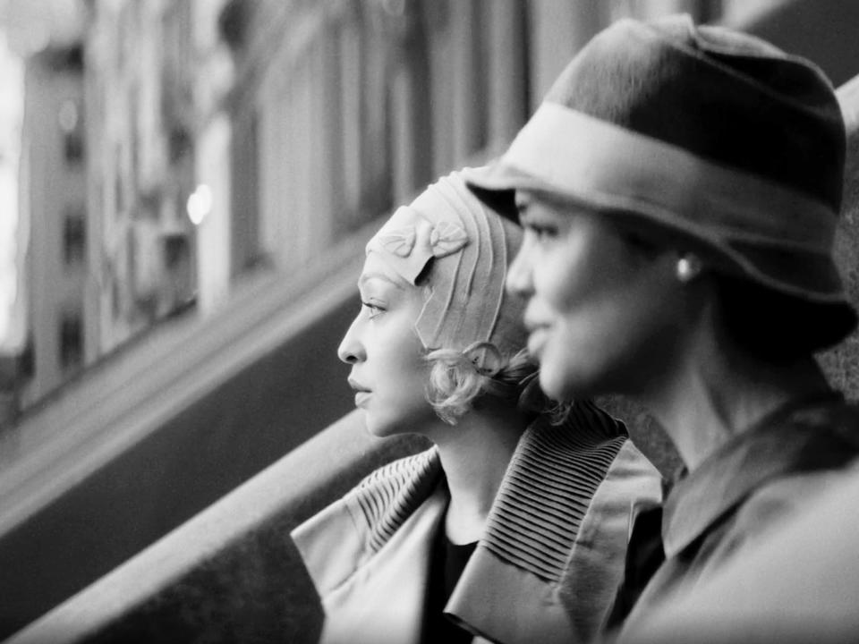 Ruth Negga and Tess Thompson sit on a stoop