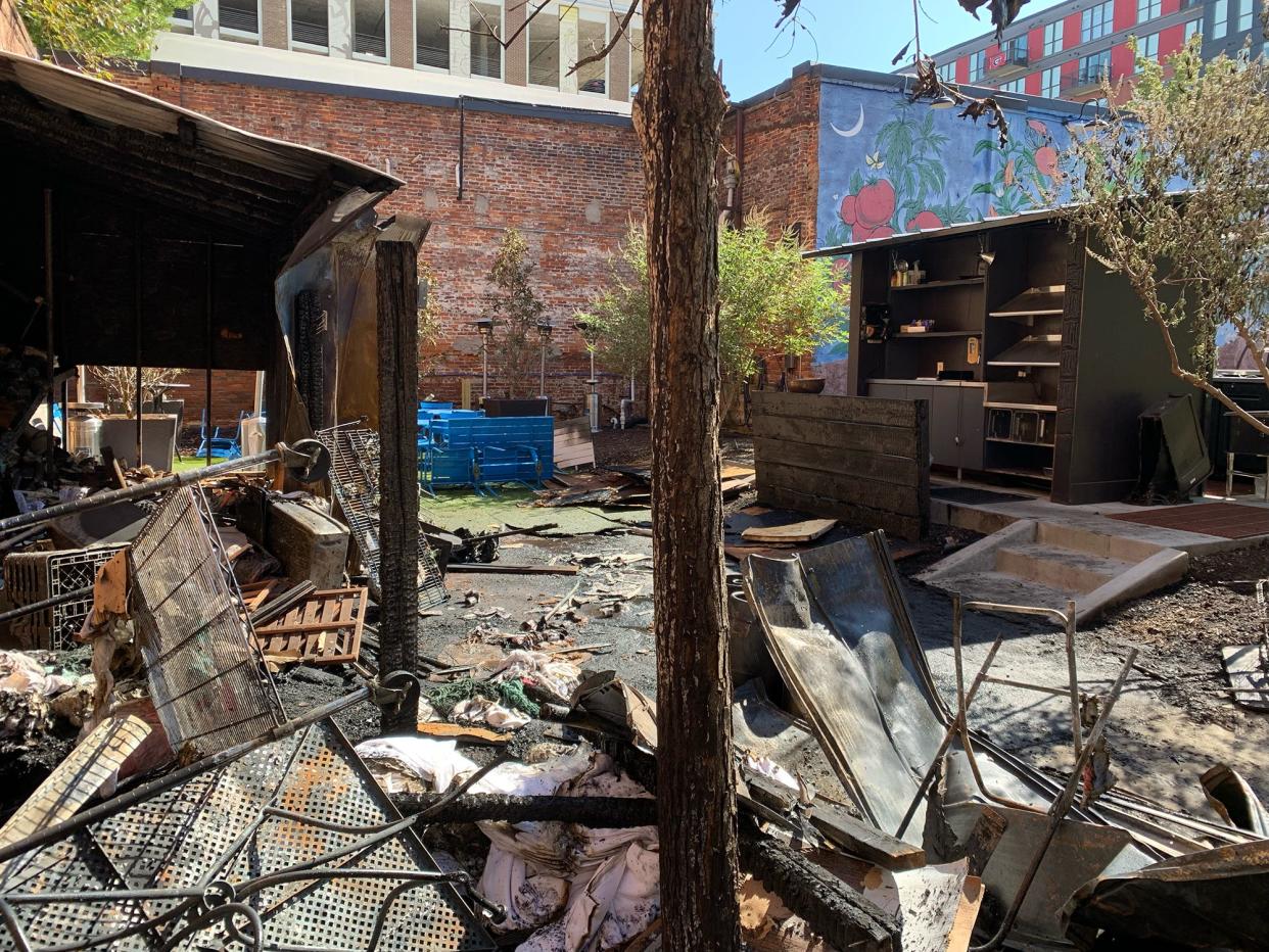 This photo taken on Tuesday, Oct. 3, 2023 shows fire damage to a shed in the back garden area of The Last Resort in Athens, Ga. Restaurant owner Melissa Clegg said that the damage would not impact dinner service.