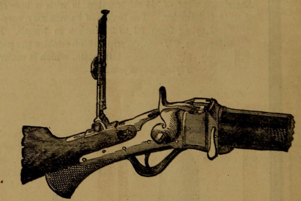 This image shows a closer look at a Sharps rifle from the 1800s.