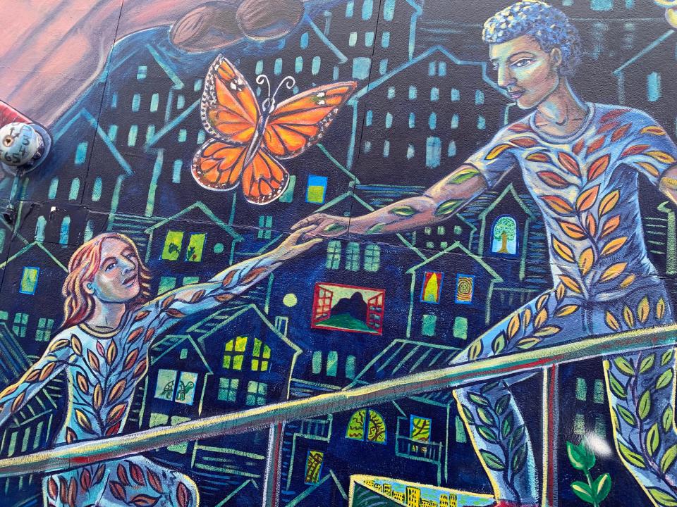 This scene is just part of the wide mural that spans the side of the Turning Point Center building on King Street below South Winooski Avenue. The artist behind the piece is Tara Goreau, who has done murals at locations across Vermont, including City Market.