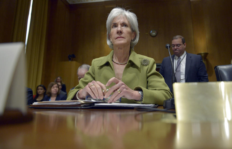Health and Human Services Secretary Kathleen Sebelius listens on Capitol Hill in Washington, Thursday, April 10, 2014, during the Senate Finance Committee hearing on the HHS Department's fiscal Year 2015 budget. A White House official says Sebelius is resigning from the Obama administration. The move comes just a week after the close of the rocky enrollment period for President Barack Obama's health care law. (AP Photo/Susan Walsh)