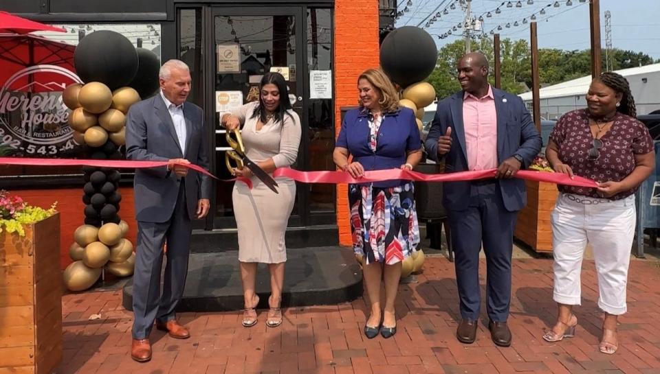 Wilmington Mayor Mike Purzycki (left) in early August 2023 was joined by Yosmaira Ramos and Wilmington City Council Members Maria Cabrera, Chris Johnson and Yolanda McCoy to celebrate the expanded Merengue House Bar & Restaurant on Union Street.