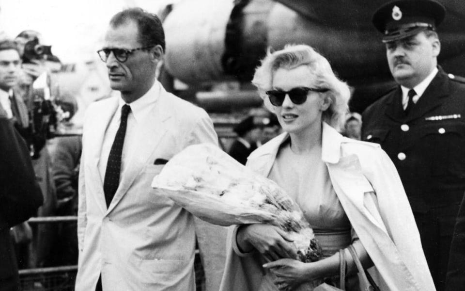 Marilyn Monroe with then-husband Arthur Miller in July 1956 - AP