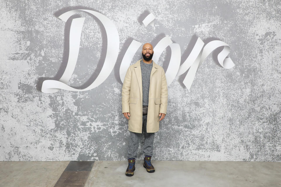 LONDON, ENGLAND - DECEMBER 08:  Common attends the Dior Men's Fall 2022 show at Olympia Grand on December 9, 2021 in London, England. (Photo by David M. Benett/Dave Benett/Getty Images for Dior)