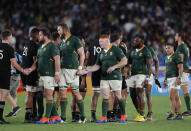 New Zealand and South African players greet each other at the end of the Rugby World Cup Pool B game in Yokohama, Japan, Saturday, Sept. 21, 2019. (AP Photo/Shuji Kajiyama)