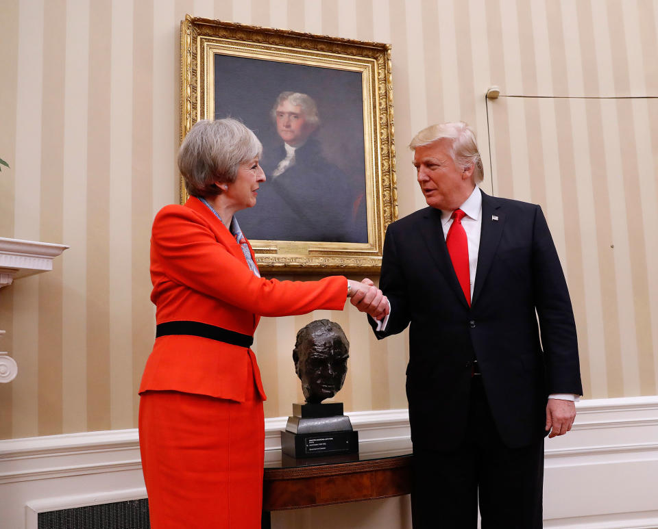 <p>President Donald Trump shakes hands with British Prime Minister Theresa May in the Oval Office of the White House in Washington, Friday, Jan. 27, 2017. (Photo: Pablo Martinez Monsivais/AP) </p>