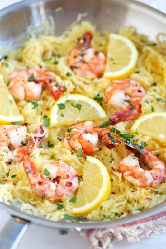 <p>Eat Yourself Skinny</p><p>If you like shrimp scampi then you will love this quick and easy lemon and herb spaghetti squash with roasted shrimp that is healthy and delicious.</p><p><a href="http://www.eat-yourself-skinny.com/2016/02/lemon-and-herb-spaghetti-squash-with-roasted-shrimp.html" rel="nofollow noopener" target="_blank" data-ylk="slk:Get the recipe here!;elm:context_link;itc:0;sec:content-canvas" class="link "><em><strong>Get the recipe here!</strong></em></a></p>