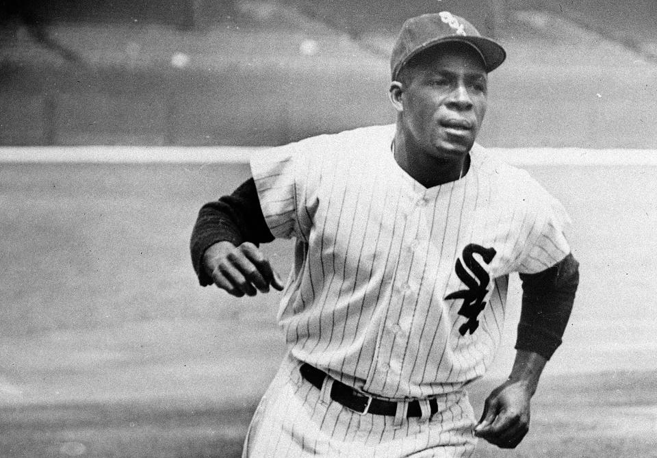 FILE - Minnie Minoso, Chicago White Sox outfielder, practices running the bases at Comiskey Park in Chicago, June 1, 1955. Minosa will be posthumously inducted into the Baseball Hall of Fame on Sunday, July 24, 2022. (AP Photo/File)