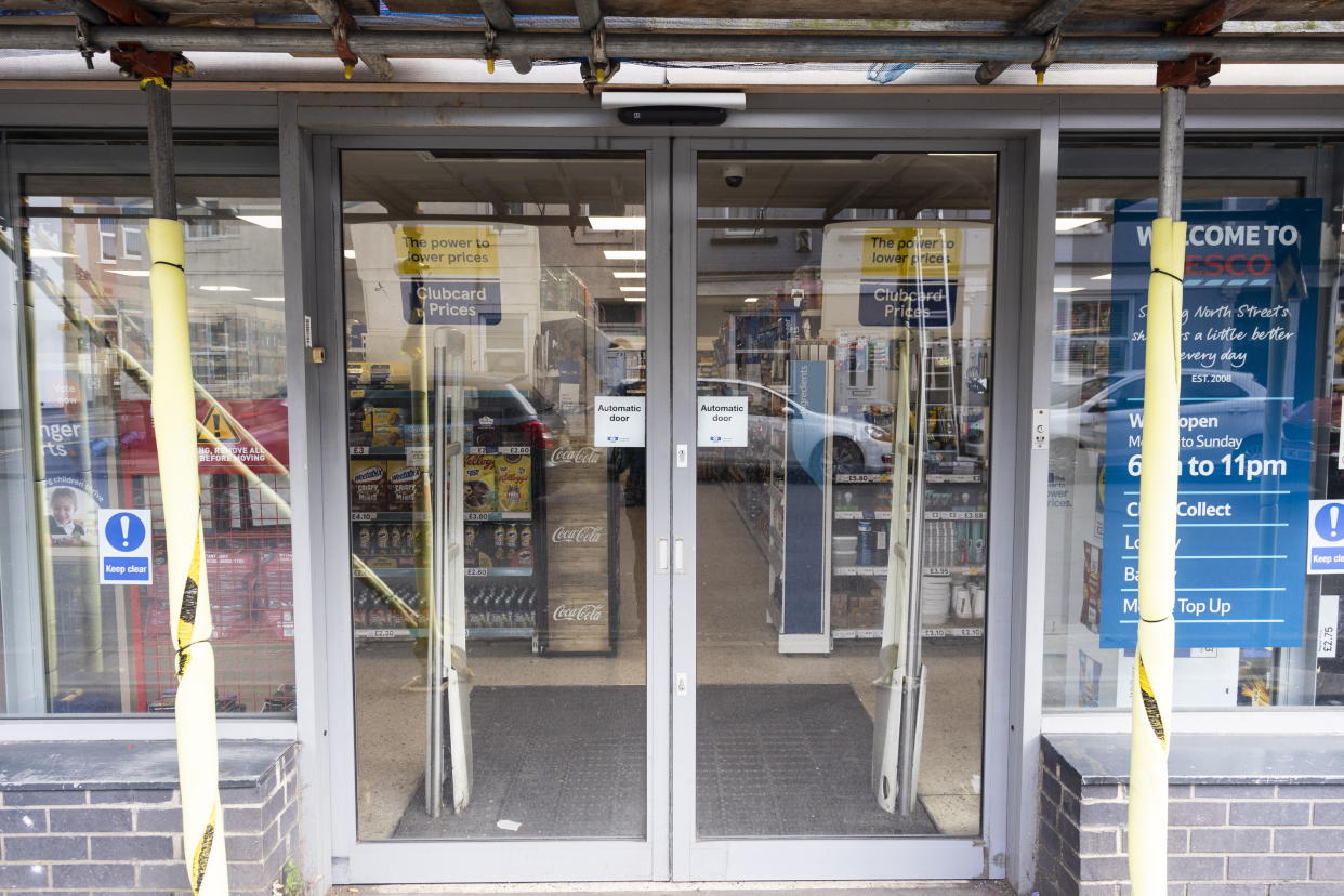 A Tesco store in Bristol is checking customers on CCTV before allowing them in. (SWNS)