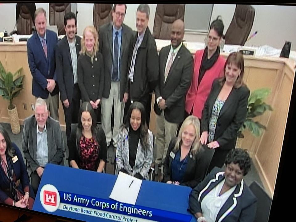 After the city signed an agreement Wednesday night with the U.S. Army Corps of Engineers to conduct a two-year flood mitigation study, various officials posed for a photo inside City Hall. The six Daytona Beach city commissioners are pictured sitting, and standing behind them are officials with the Corps of Engineers, St. Johns River Water Management District, Florida Department of Transportation District 5, Daytona Regional Chamber of Commerce and employees representing U.S. Rep. Michael Waltz and U.S. Sen. Marco Rubio.