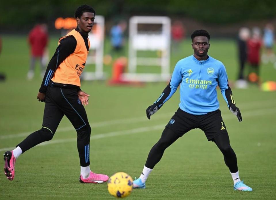 Ayden Heaven (L) trains with the Arsenal first team (Photo via Heaven on Instagram)