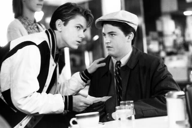 <p>20th Century Fox/Courtesy Everett Collection</p> River Phoenix and Matthew Perry in "A Night in the Life of Jimmy Reardon" (1988)