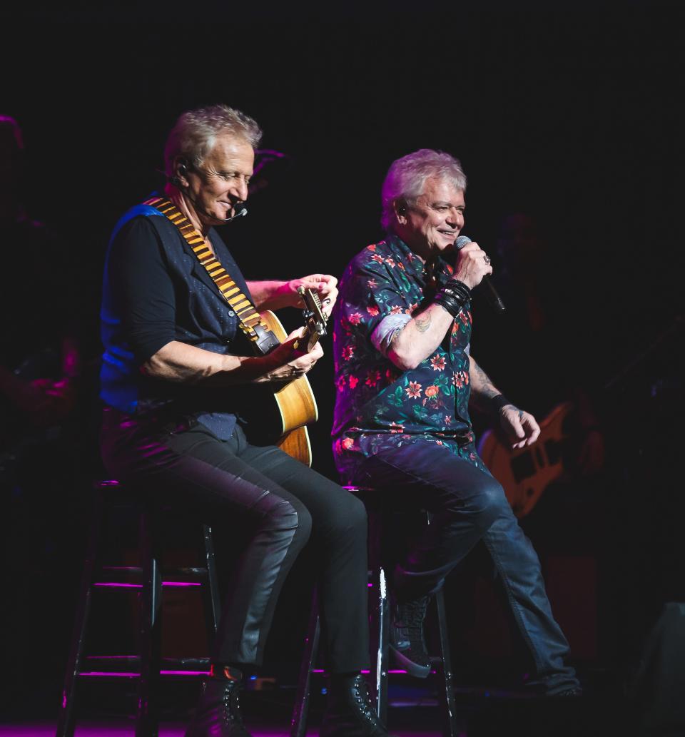 Air Supply perform on stage.