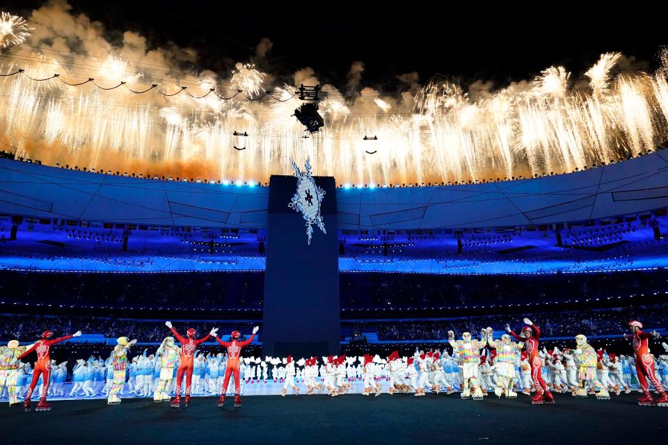 A fireworks display after the Olympic flame was lit during the opening ceremony in Beijing on Friday.