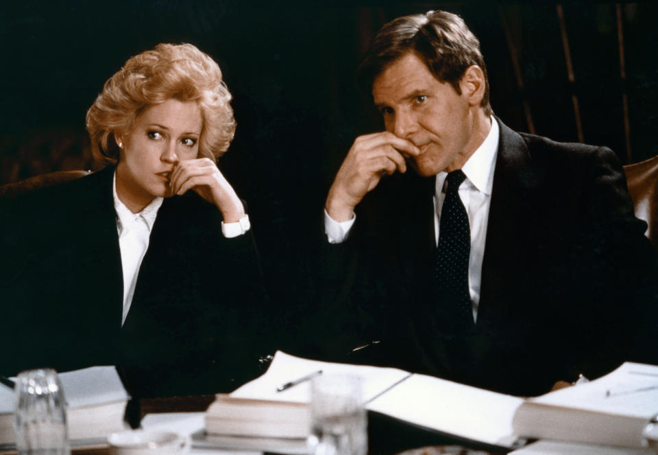 American actors Melanie Griffith and Harrison Ford on the set of Working girl directed by German-born American Mike Nichols. (Photo by Sunset Boulevard/Corbis via Getty Images)