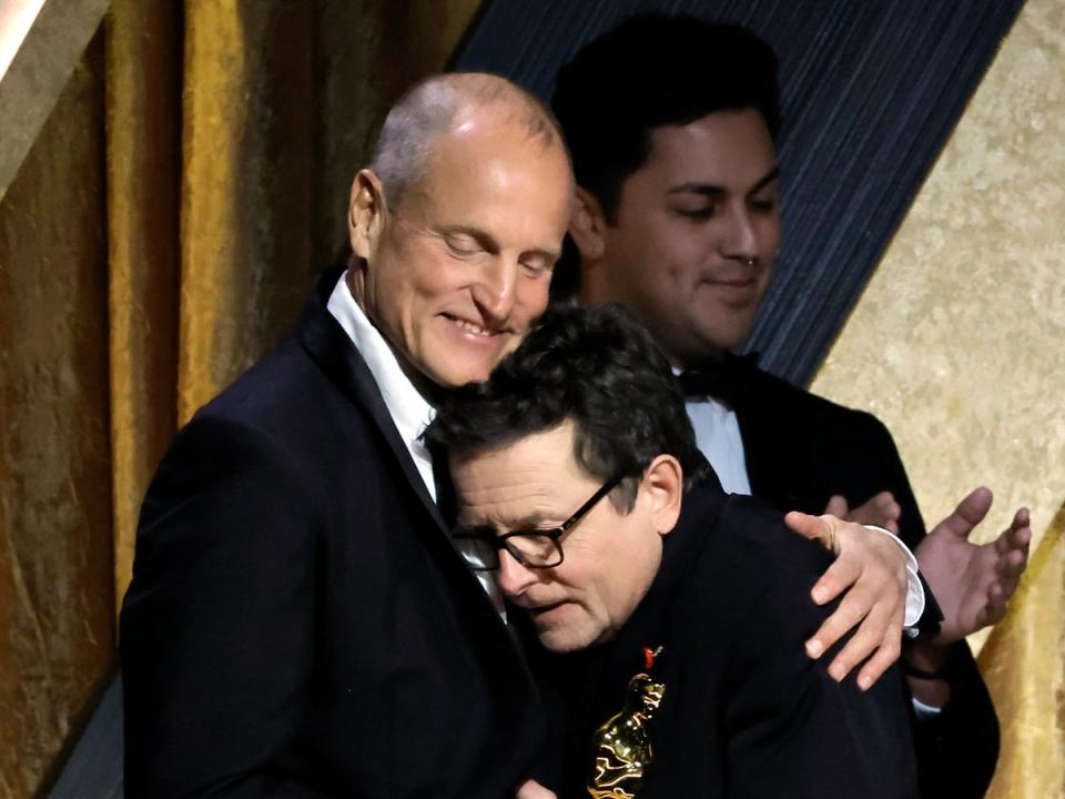 Woody Harrelson presenting Michael J Fox with an award (Getty Images)