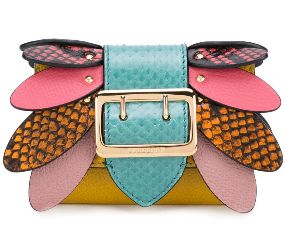 <p>Buckle Detail Wallet by Burberry, $392, <a rel="nofollow noopener" href="https://www.farfetch.com/shopping/women/burberry-buckle-detail-wallet--item-11895689.aspx?storeid=9148&from=listing&ffref=lp_pic_749_2_" target="_blank" data-ylk="slk:farfetch.com;elm:context_link;itc:0;sec:content-canvas" class="link ">farfetch.com</a>.</p>