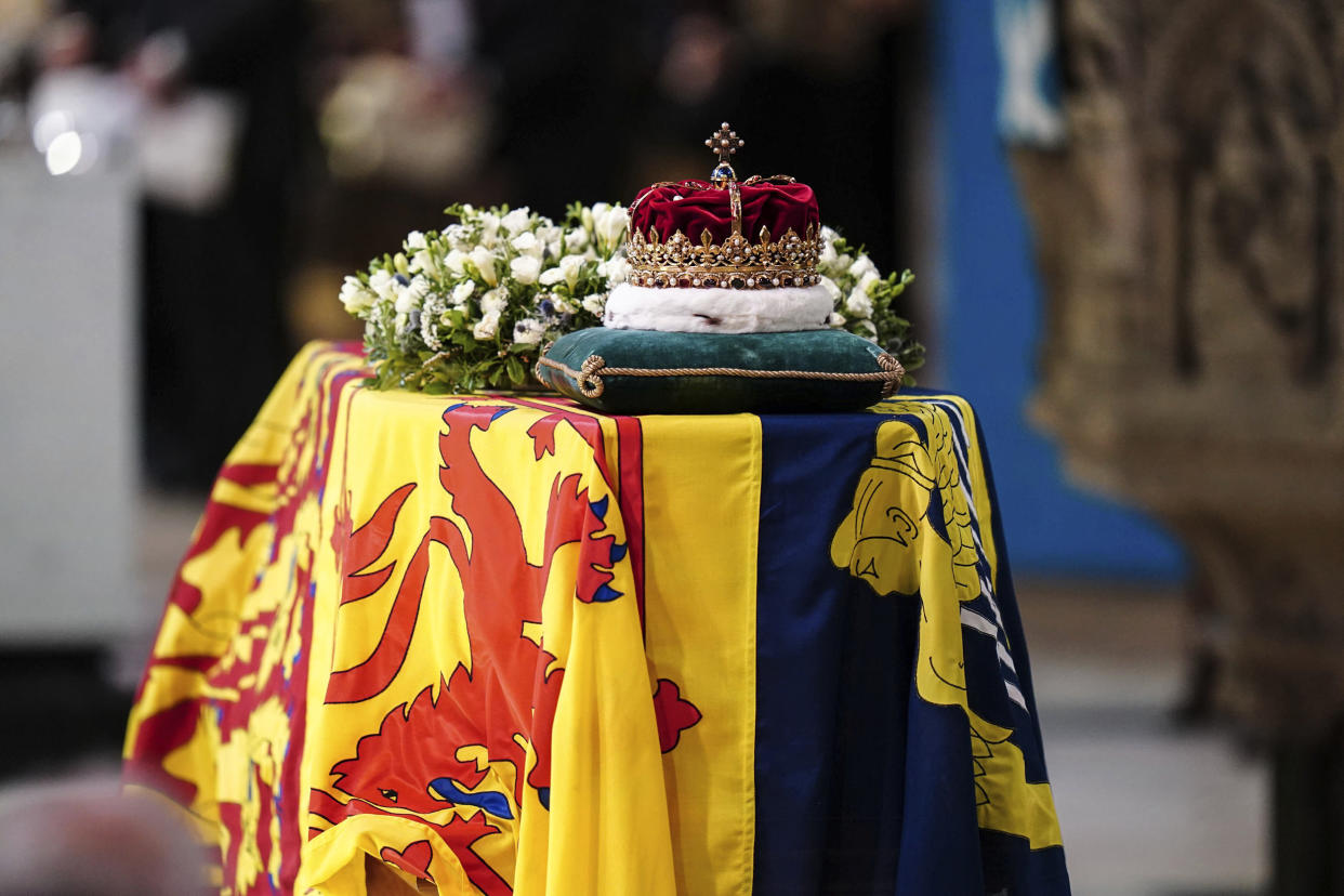 Image: The Crown of Scotland sits atop the coffin of Queen Elizabeth II during a Service of Prayer and Reflection for her life at St Giles' Cathedral, Edinburgh, Scotland on Sept. 12, 2022. (Jane Barlow / PA via AP)