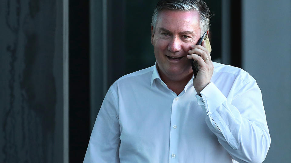 Eddie McGuire talks on his mobile phone.