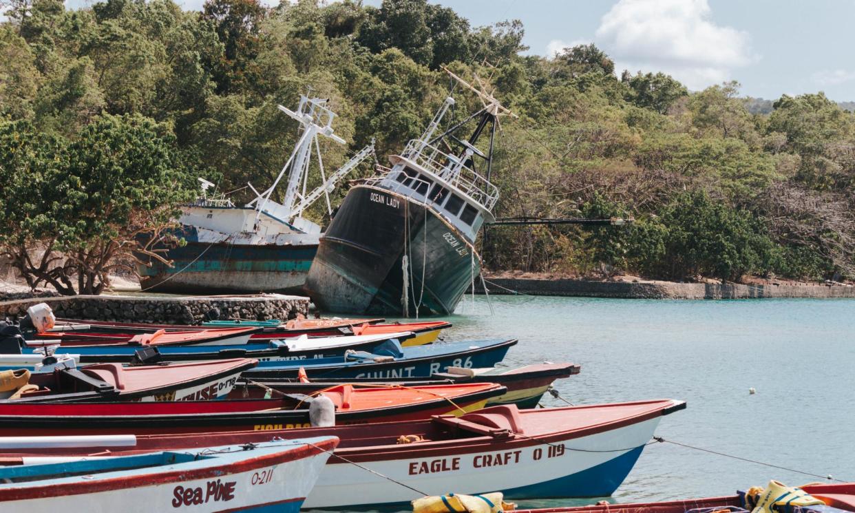 <span>Two vessels dragged ashore by the exceptional tides.</span><span>Photograph: Gladstone Taylor</span>