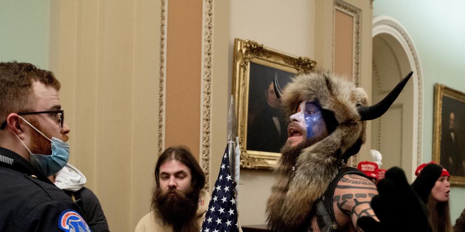 Qanon shaman viking riot capitol