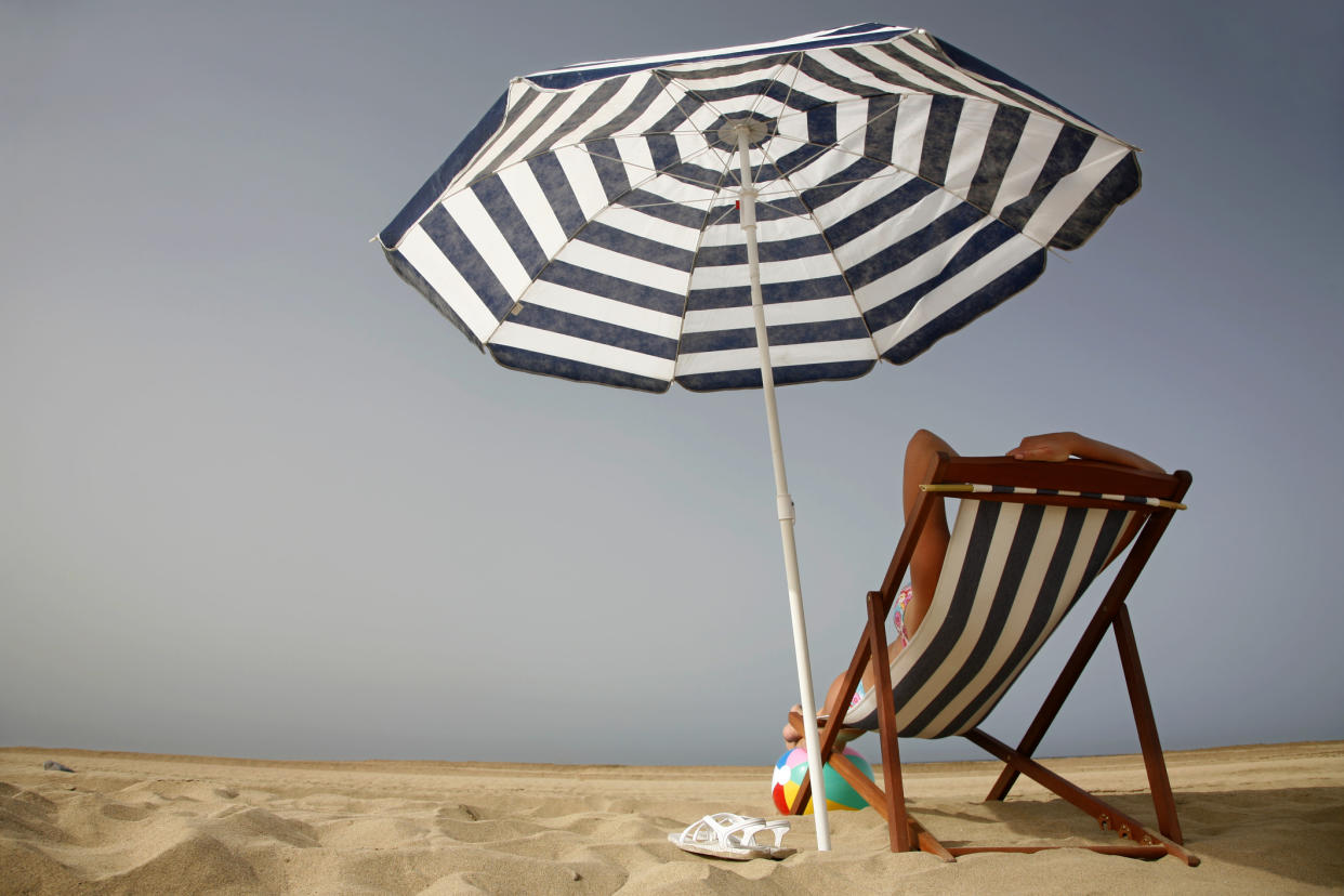 A beach umbrella doesn’t seem like a dangerous projectile, but it can be. (Photo: Getty Images)