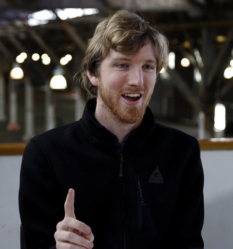 In this photograph taken on Monday, April 10, 2017, Luminar CEO Austin Russell gestures while speaking to a reporter in San Francisco. Russell, now 22, was barely old enough to drive when he set out to create a safer navigation system for robot-controlled cars. Russell's ambitions are about to be tested five years after he co-founded Luminar Technologies, a Silicon Valley startup trying to steer the rapidly expanding self-driving car industry in a new direction. (AP Photo/Ben Margot)