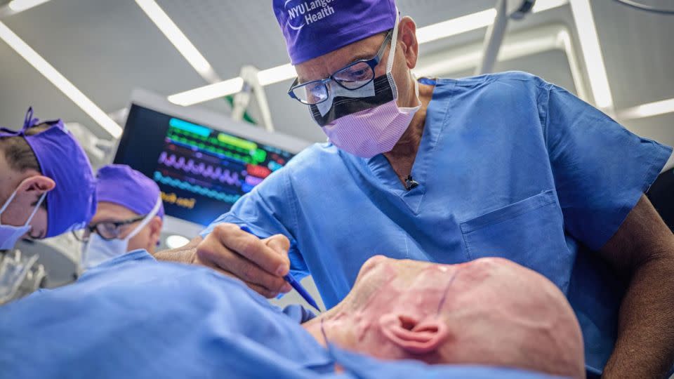 Dr. Eduardo Rodriguez, director of the Face Transplant Program at NYU Langone Health, performs the whole-eye and partial face transplantation surgery. - NYU Langone Health