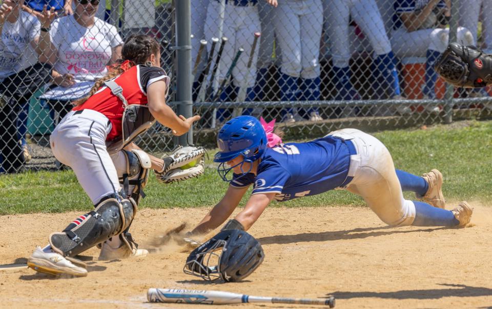 Christina Ginex tries to beat a throw at the plate in the 2022 NJSIAA Non-Public South A final.