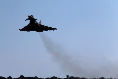 File photo - A British Royal Air Force Typhoon aircraft takes off from RAF Akrotiri in Cyprus September 22, 2016, for a mission in Iraq. REUTERS/Petros Karadjias