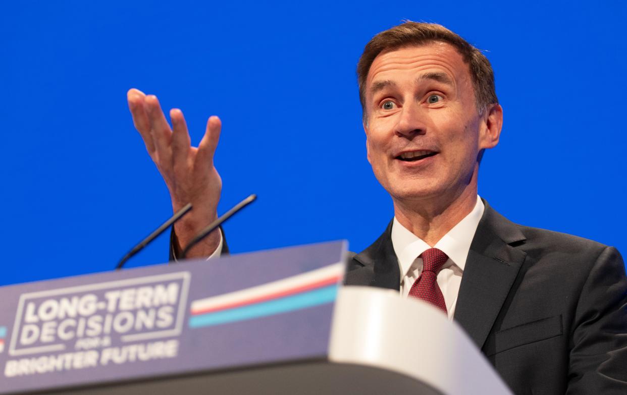 Manchester, UK. 02nd Oct, 2023. Jeremy Hunt Chancellor of the Exchequer addresses the main hall on the second day of the Conservative Conference. Manchester UK. Credit: GaryRobertsphotography/Alamy Live News