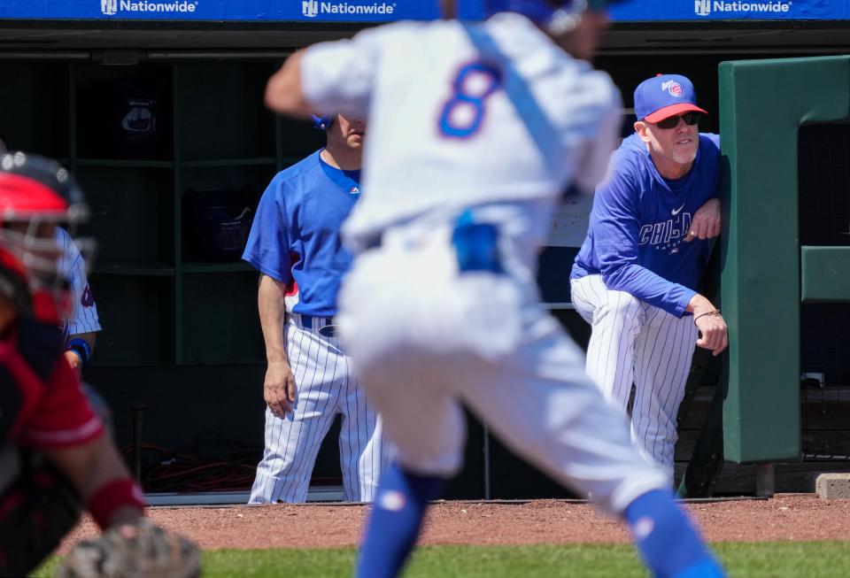 Iowa Cubs batting coach John Mallee, right, coaches during a game against Louisville on Thursday, April 27.
