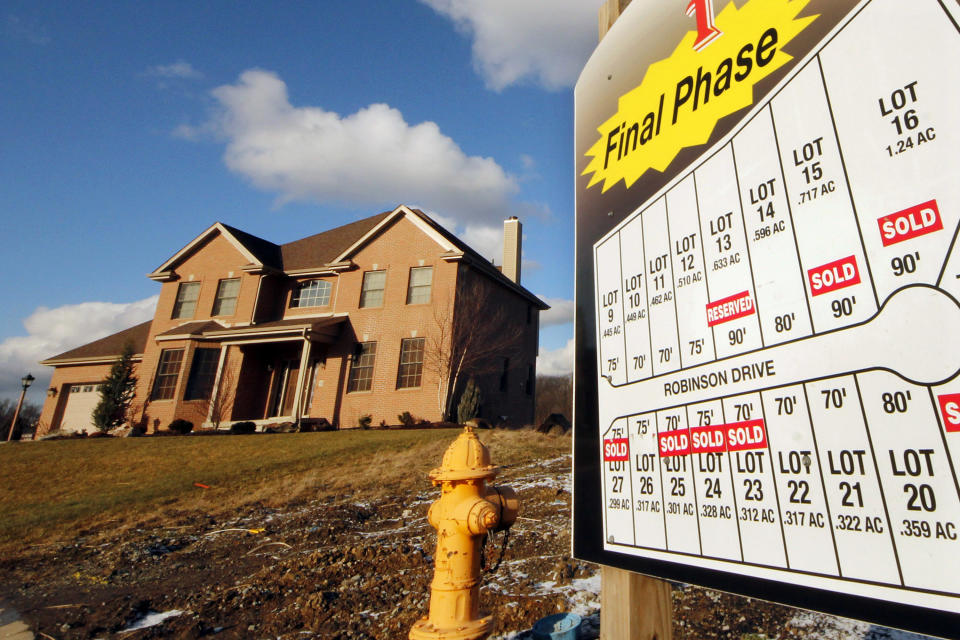 This Jan. 18, 2012 photo shows a new home in a development in Pleasant Hills, Pa. Fewer people bought new homes in December, making 2011 the worst sales year on record. (AP Photo/Gene J. Puskar)