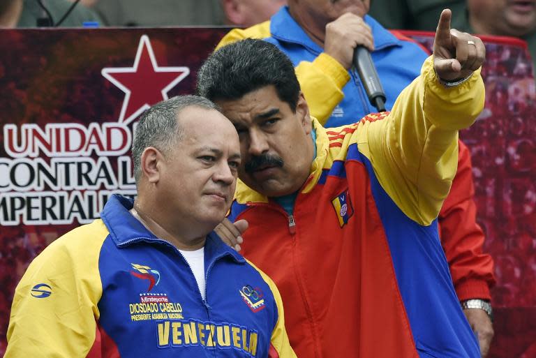 Nicolás Maduro (i) junto a Diosdado Cabello (AFP)