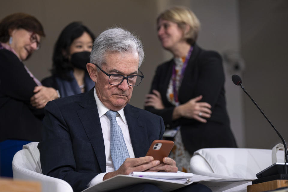 WASHINGTON, DC - OCTOBER 14: Chair of the U.S. Federal Reserve Jerome Powell checks his phone during a meeting of the IMFC (International Monetary and Financial Committee) at the IMF and World Bank Annual Meetings at IMF headquarters, October 14, 2022 in Washington, DC. Secretary Yellen will hold a news conference and take questions later in the day. (Photo by Drew Angerer/Getty Images)
