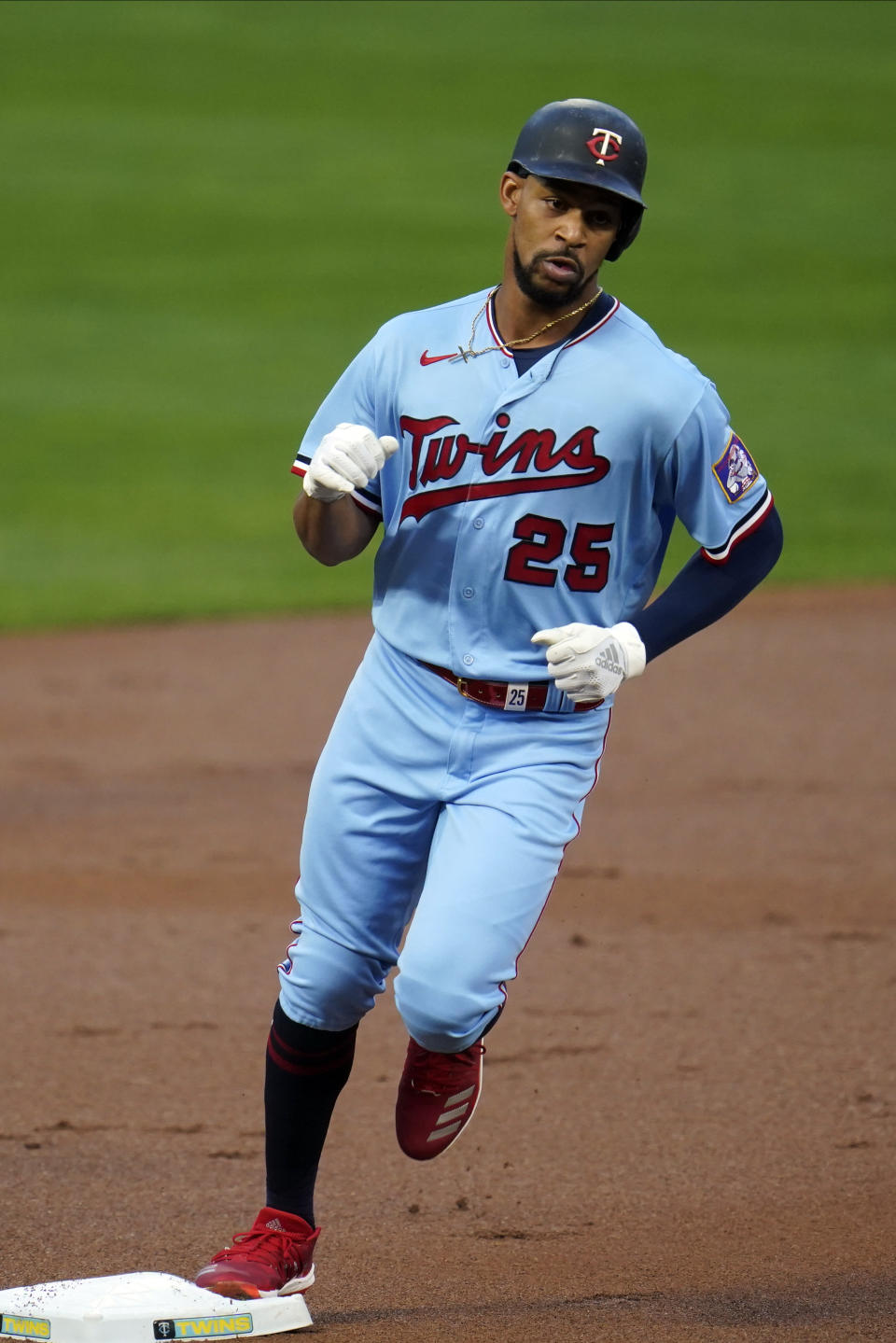 Minnesota Twins' Byron Buxton rounds third base on a solo home run off Detroit Tigers pitcher Tarik Skubal in the first inning of a baseball game Tuesday, Sept. 22, 2020, in Minneapolis. (AP Photo/Jim Mone)