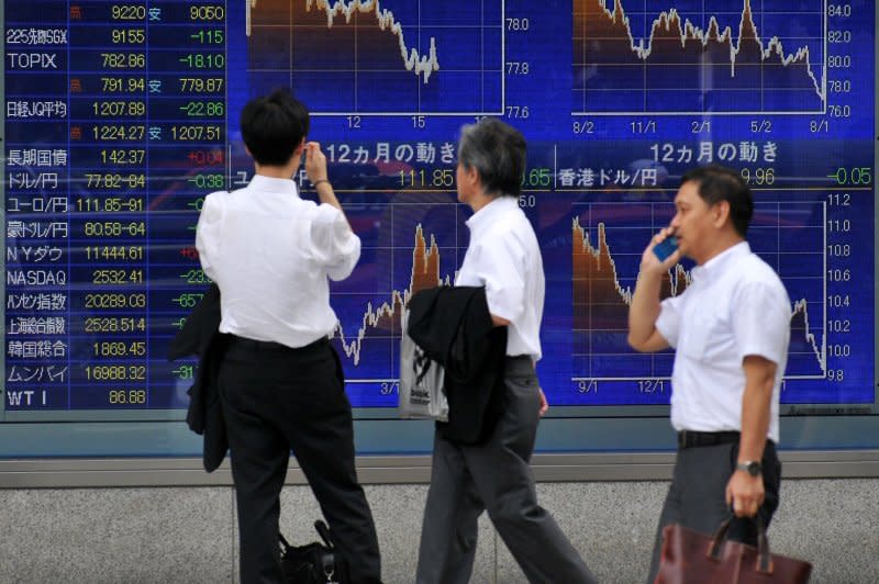 The Nikkei Stock Average closed Thursday at 332.89 points while the broader Topix index finished 26.29 points going over its last high 35 years ago in 1989 as the U.S. dollar’s value in Japan fell toward the lower 161 yen range this week. File Photo by Keizo Mori/UPI