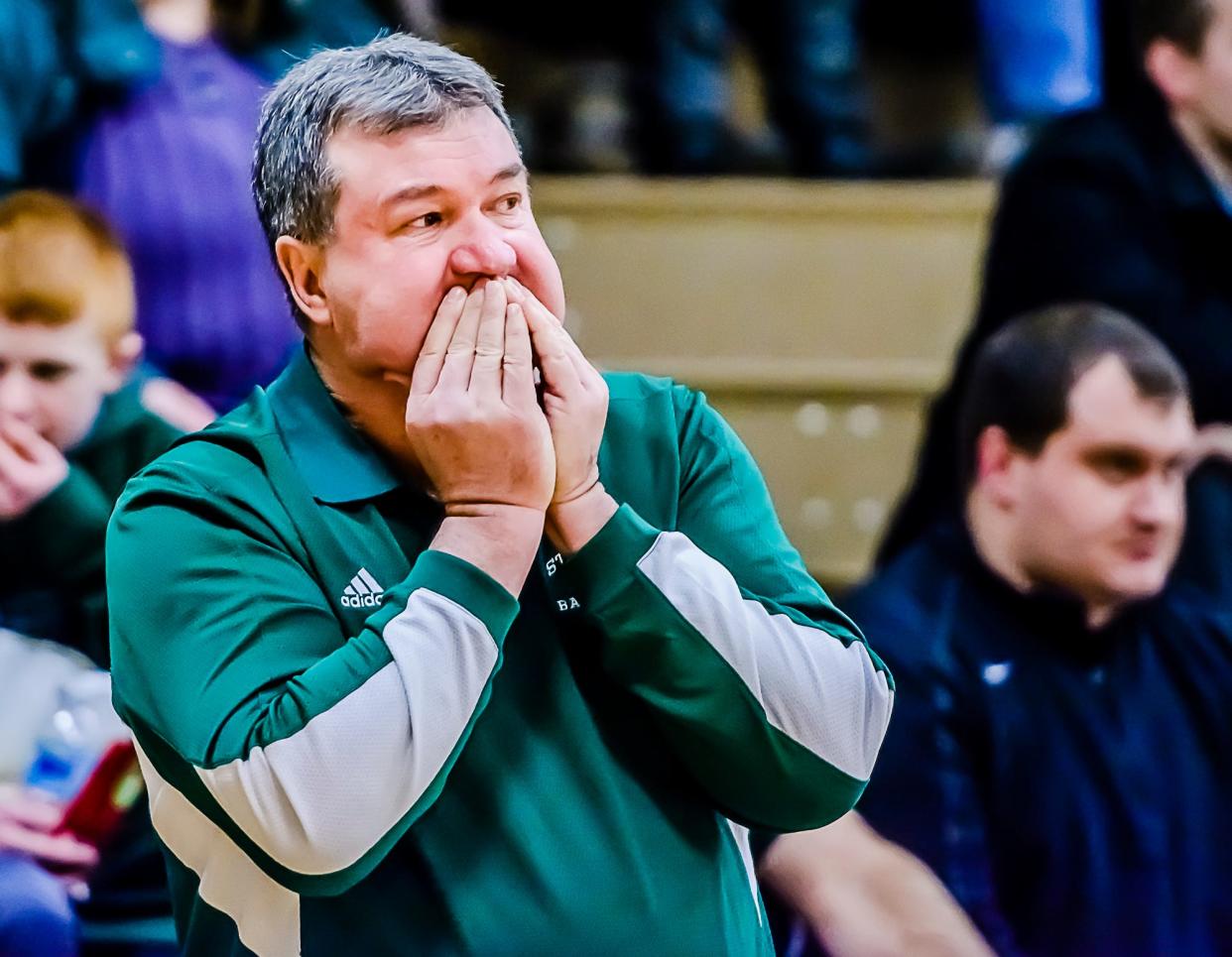 Portland St. Patrick's Girls Basketball Head Coach Al Schrauben reacts after a foul is called on one of his players late in the 1st half of the Shamrocks' game with Laingsburg.